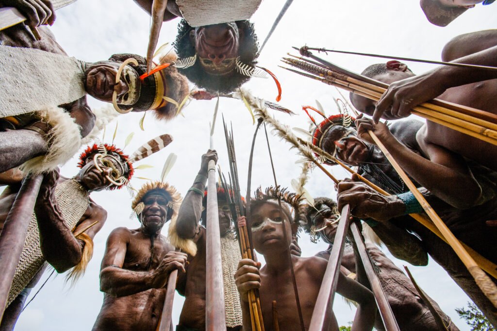 DANI VILLAGE, WAMENA, IRIAN JAYA, NEW GUINEA, INDONESIA - 25 JULY 2009: Dani tribe Warriors.