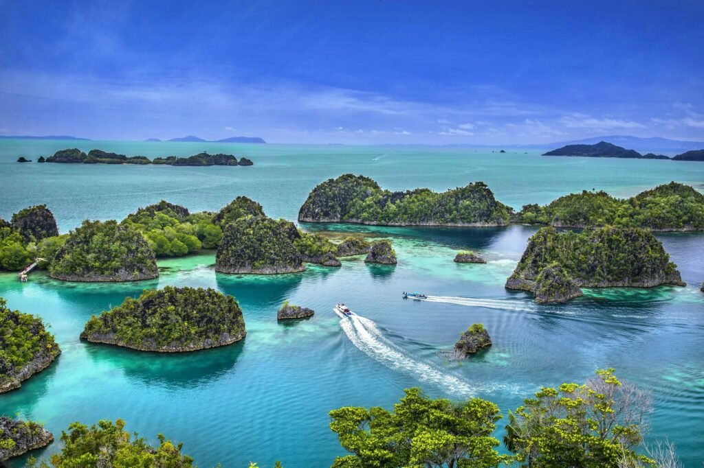 A stunning aerial shot of the lush Raja Ampat Islands in Papua Barat, Indonesia.